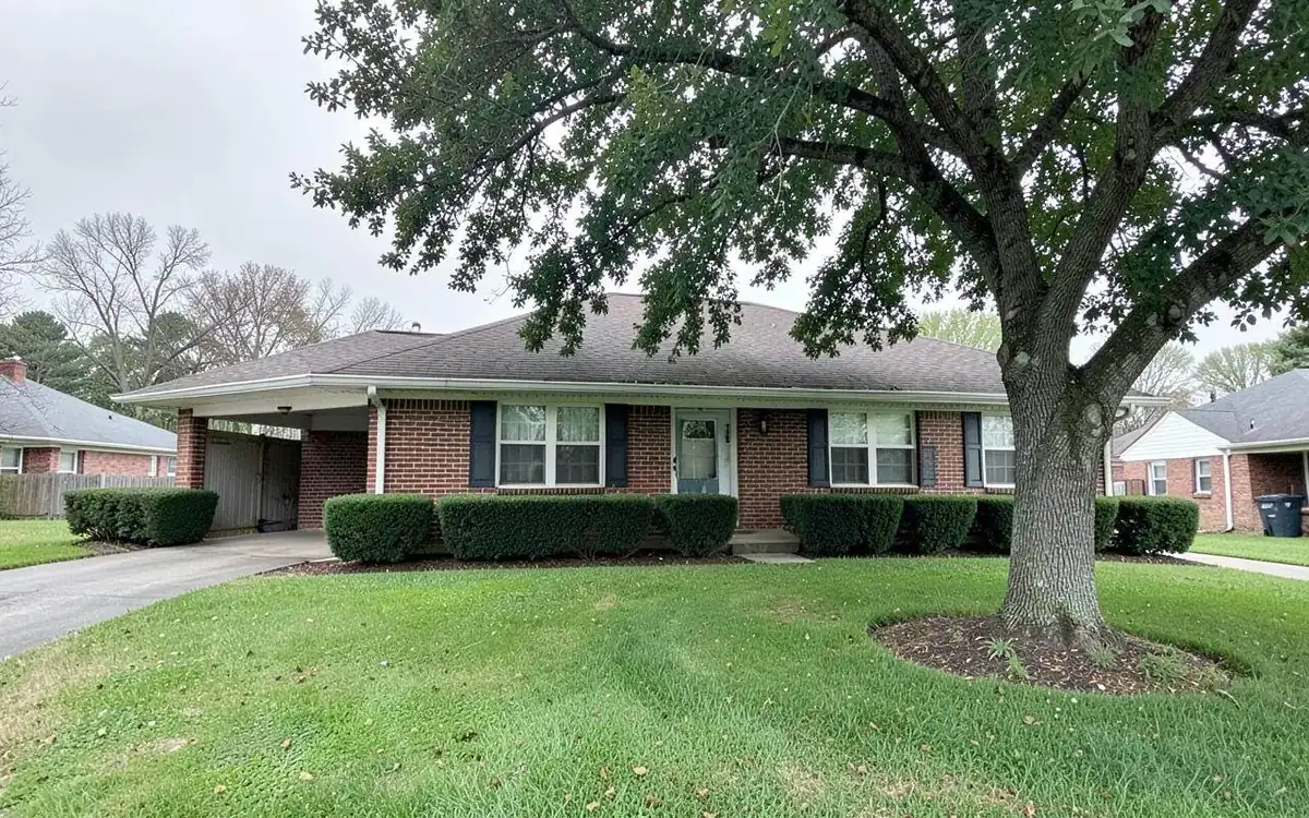 Brick ranch home with a carport in a North Mississippi neighborhood