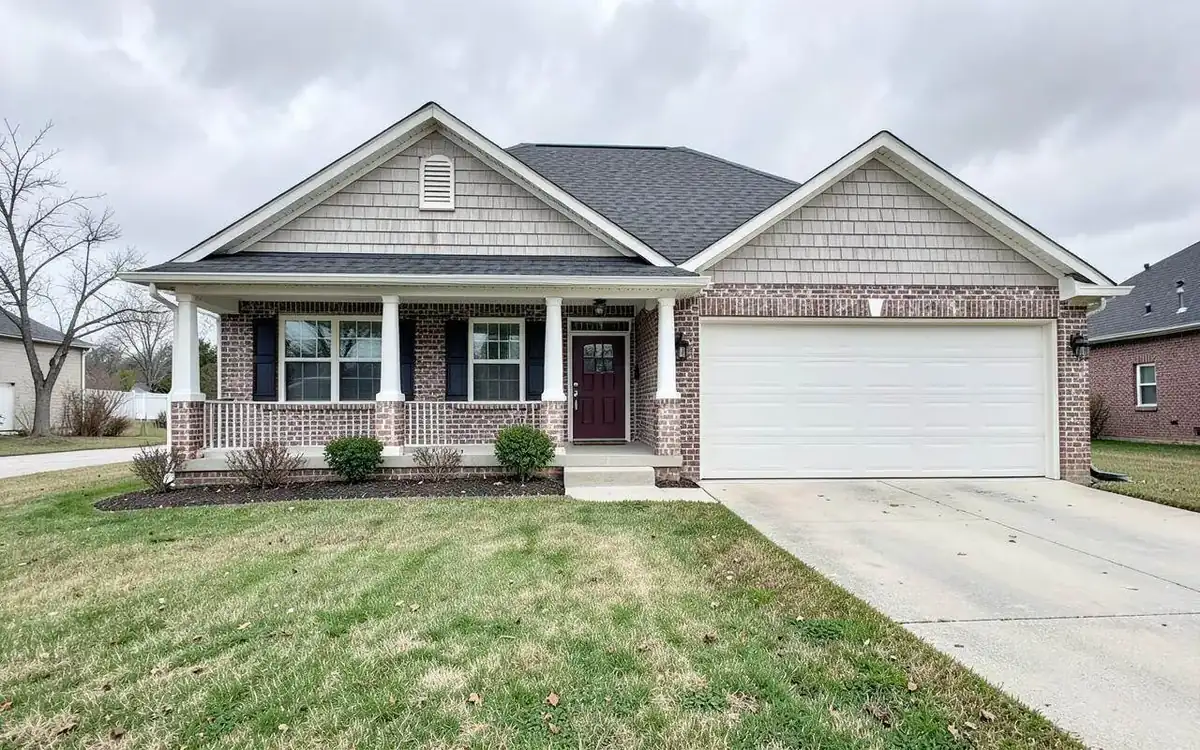 Newer craftsman-style home in a North Mississippi subdivision with a two-car garage