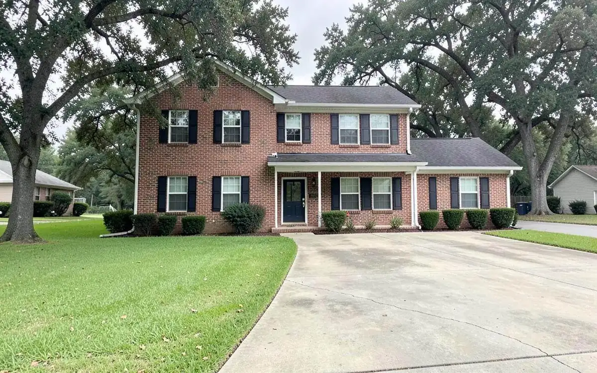 Well-kept two-story brick home on an established street in North Mississippi