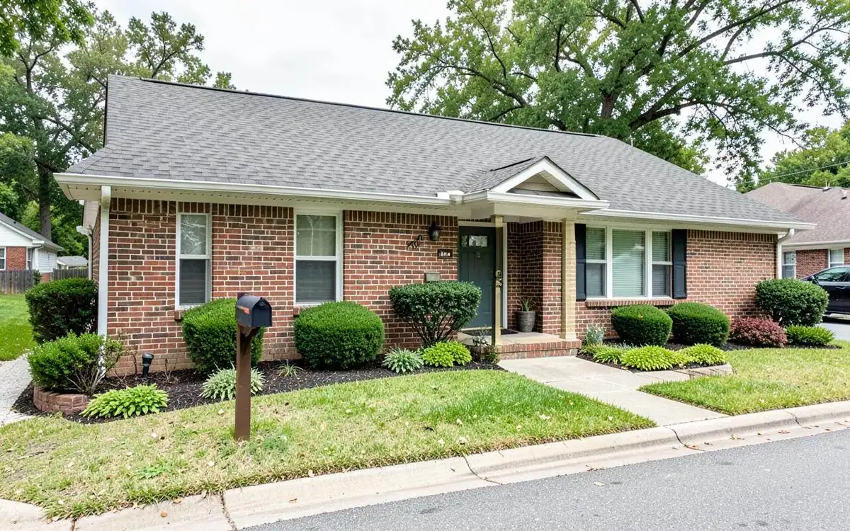 Updated brick ranch home with fresh landscaping in a Tupelo, Mississippi neighborhood